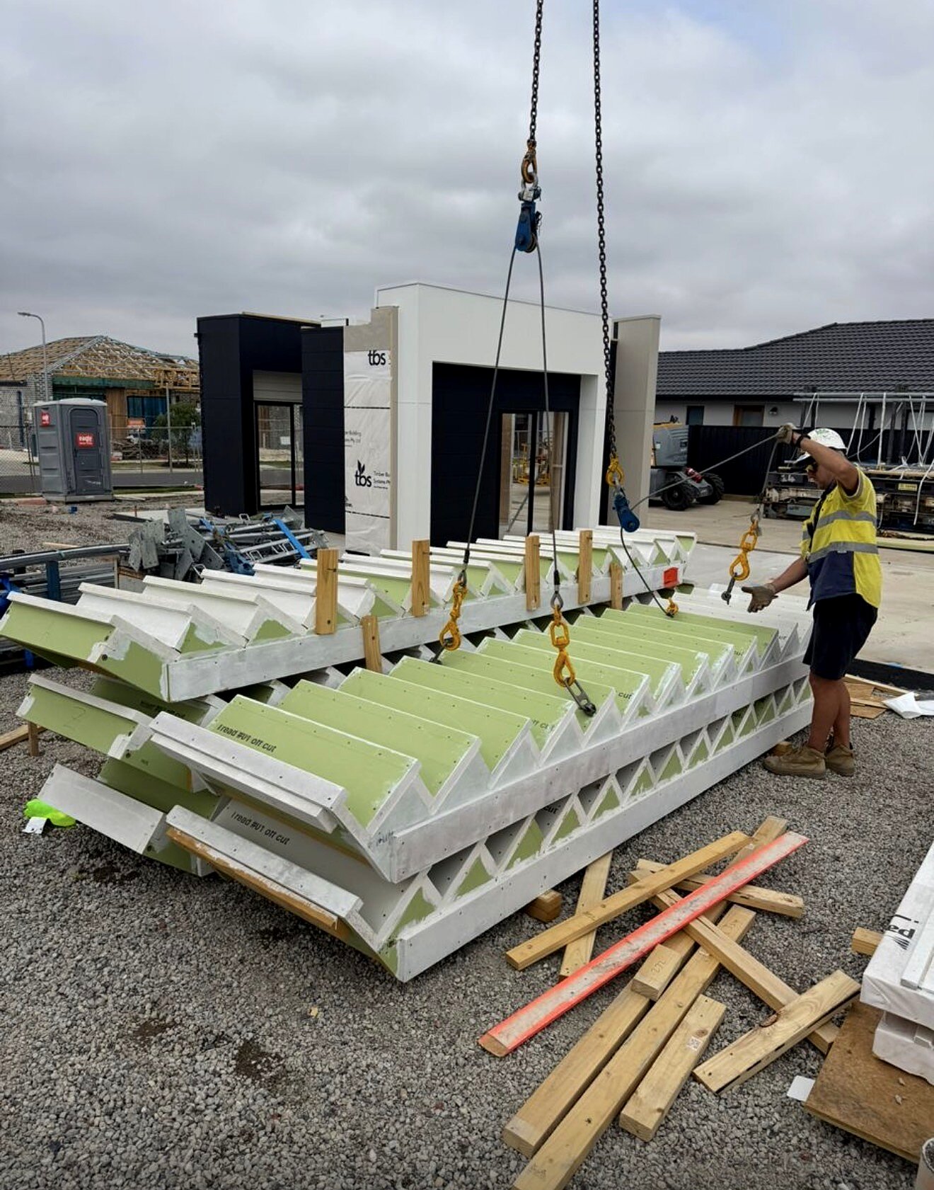 Prefabricated roof trusses staged on site at the Ausco Port Melbourne project